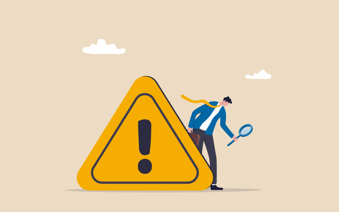 Ausrufezeichen - daneben steht eine Comicfigur mit Lupe